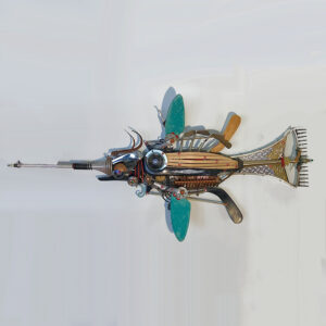 This fish is constructed of hockey sticks, garden tools, golf clubs, ceramic fins and various machine parts