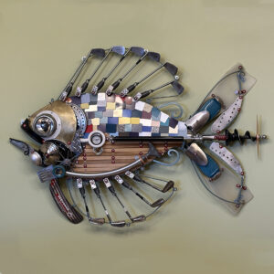 A goldfish with golf clubs, formica chips, diving fins, copper and wood.