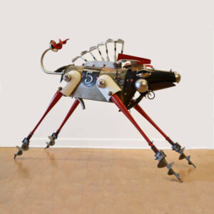 A race horse made of a mailbox, aluminum baseball bats, dock augers, golf clubs and various machine parts.